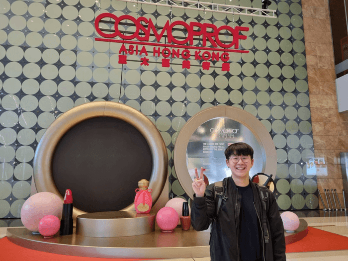 Presenting Korean beauty brands at a trade show booth